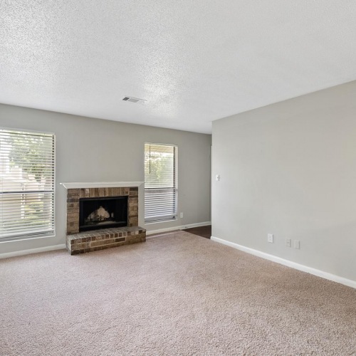Relax and unwind in stylish living spaces a room with a fireplace